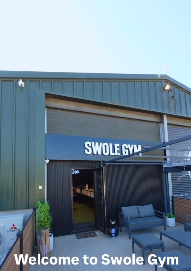 The entrance to Swole Gym in Ripley, with outdoor seating
